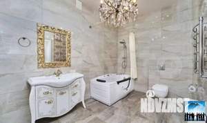 Коттедж 600м², 3-этажный, участок 8 сот.  